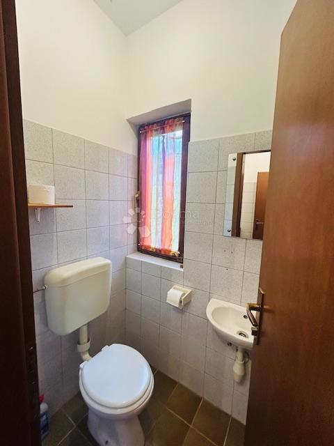 CASA CON VISTA MARE E UFFICI AL PIANO TERRA