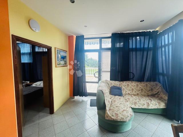 CASA CON VISTA MARE E UFFICI AL PIANO TERRA