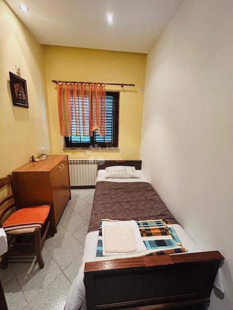 CASA CON VISTA MARE E UFFICI AL PIANO TERRA