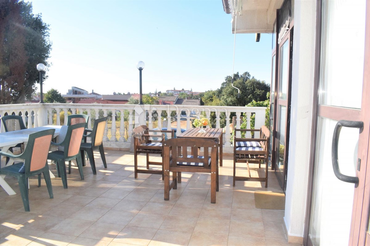 CASA CON VISTA MARE E UFFICI AL PIANO TERRA