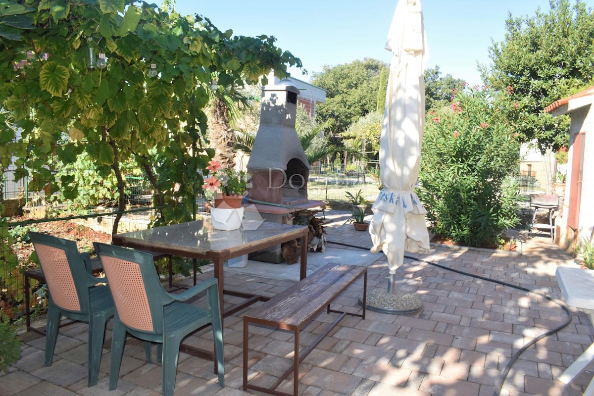 CASA CON VISTA MARE E UFFICI AL PIANO TERRA