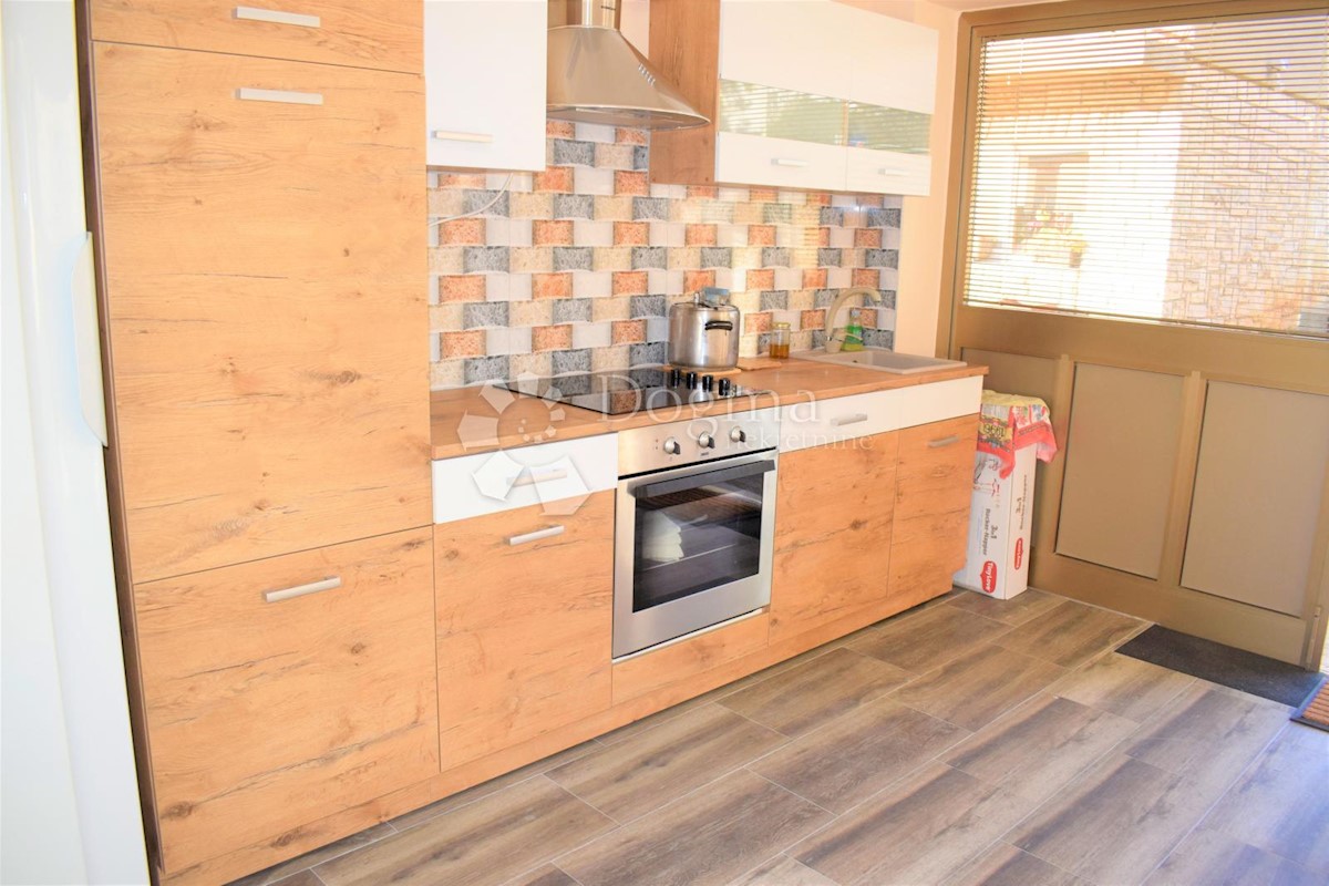 APPARTAMENTO FAMIGLIARE E CASA IN OTTIMA POSIZIONE