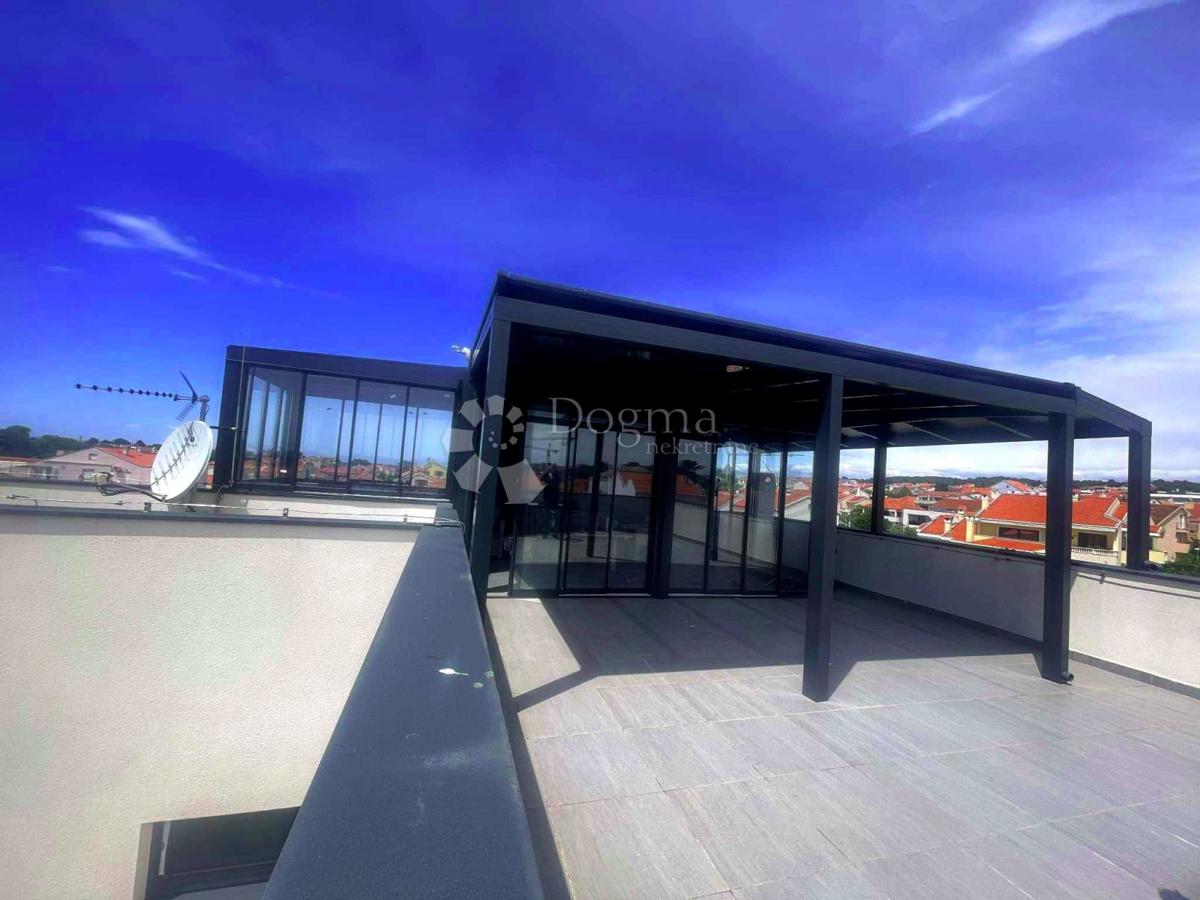 Attico di lusso – terrazza sul tetto e vista mare