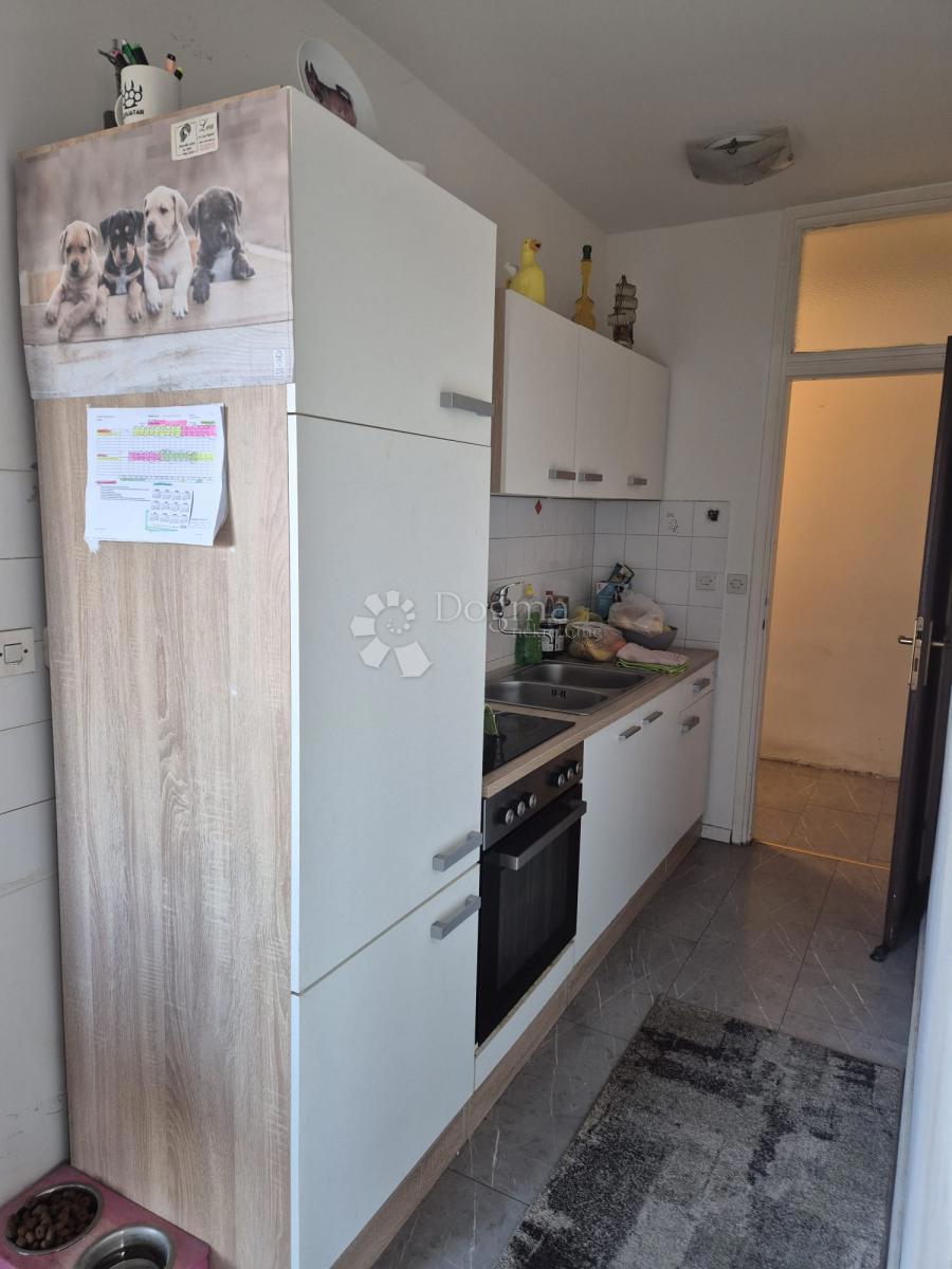 Appartamento in vendita a Kman – disposizione funzionale, vista sul parco