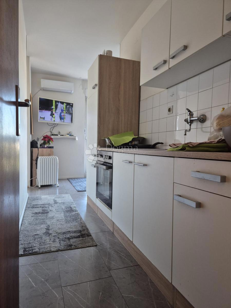 Appartamento in vendita a Kman – disposizione funzionale, vista sul parco