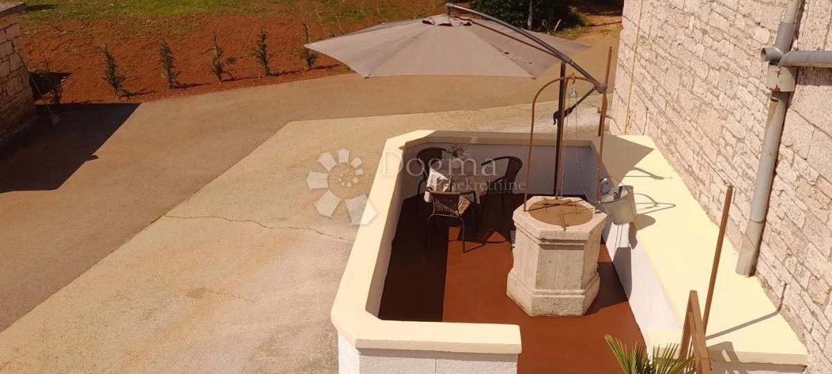 Casa con appartamento ristrutturato e terreno edificabile, a 5 minuti da Pisino