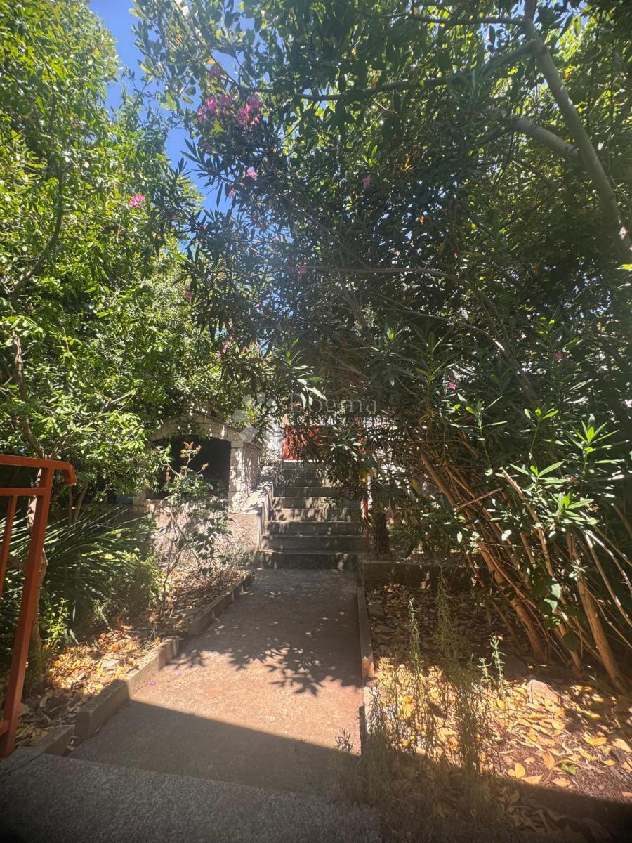 Casa con due appartamenti – vista sulla baia