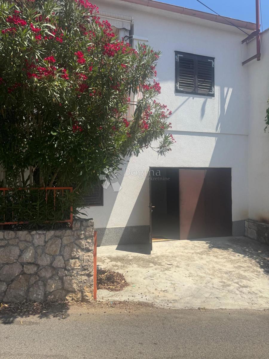 Casa con due appartamenti – vista sulla baia