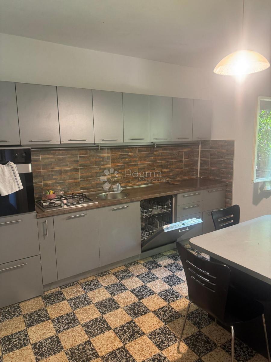 Casa con due appartamenti – vista sulla baia