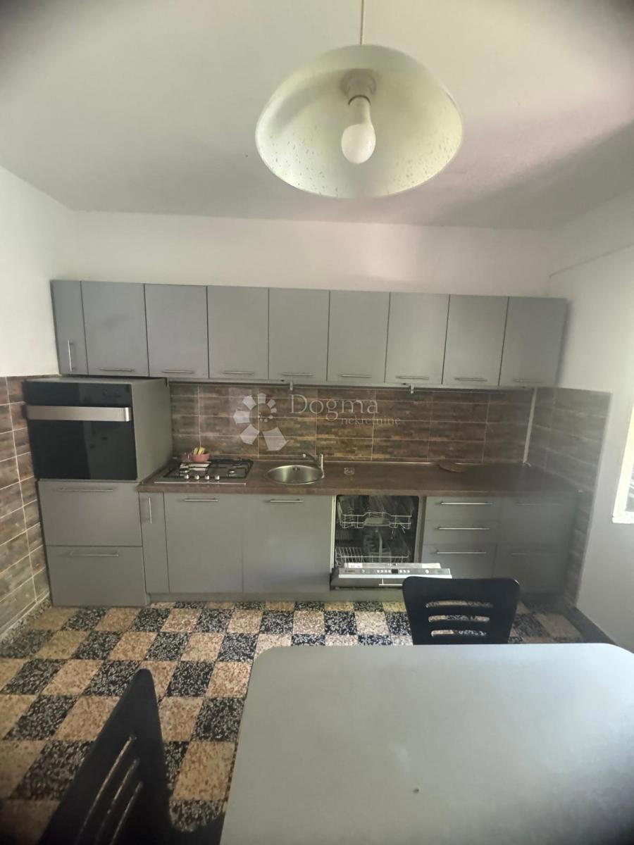 Casa con due appartamenti – vista sulla baia