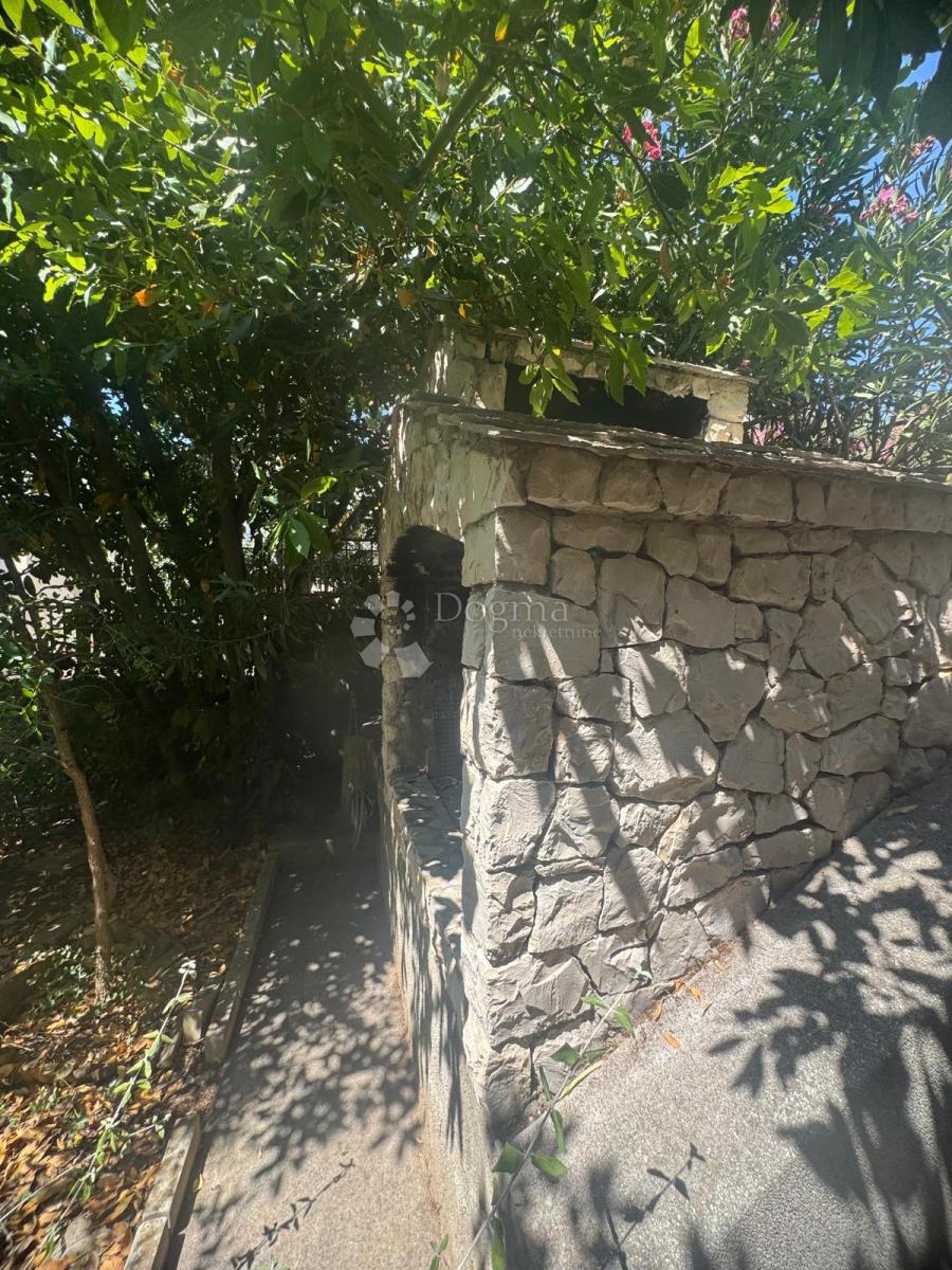 Casa con due appartamenti – vista sulla baia