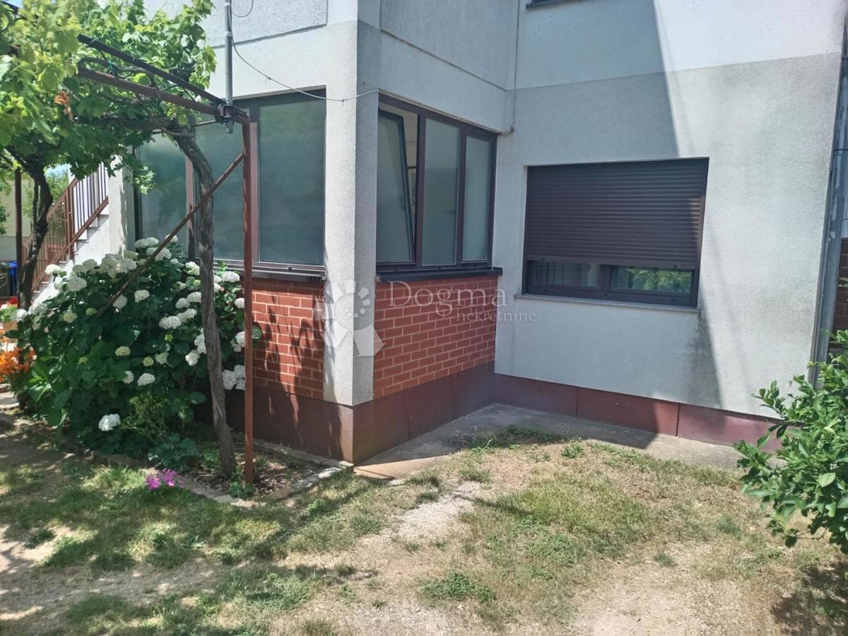 Occasione! Appartamento con giardino e posto auto