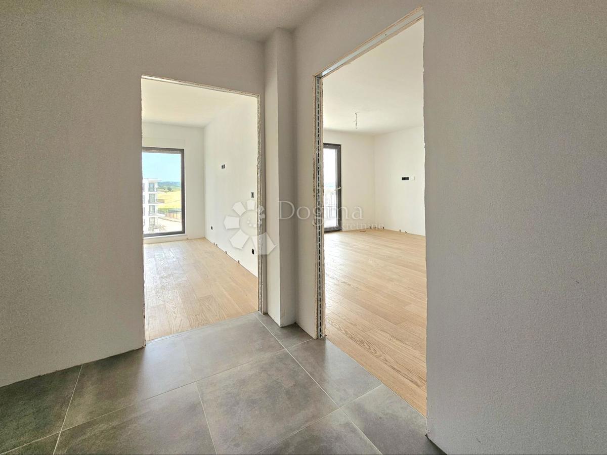 Nuova costruzione, 2 camere da letto, 2 bagni, 2 posti auto, ascensore