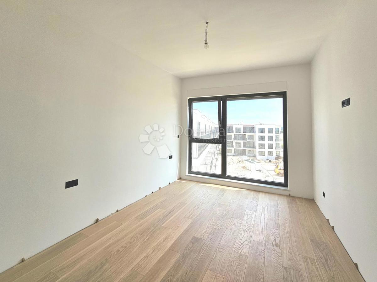 Nuova costruzione, 2 camere da letto, 2 bagni, 2 posti auto, ascensore