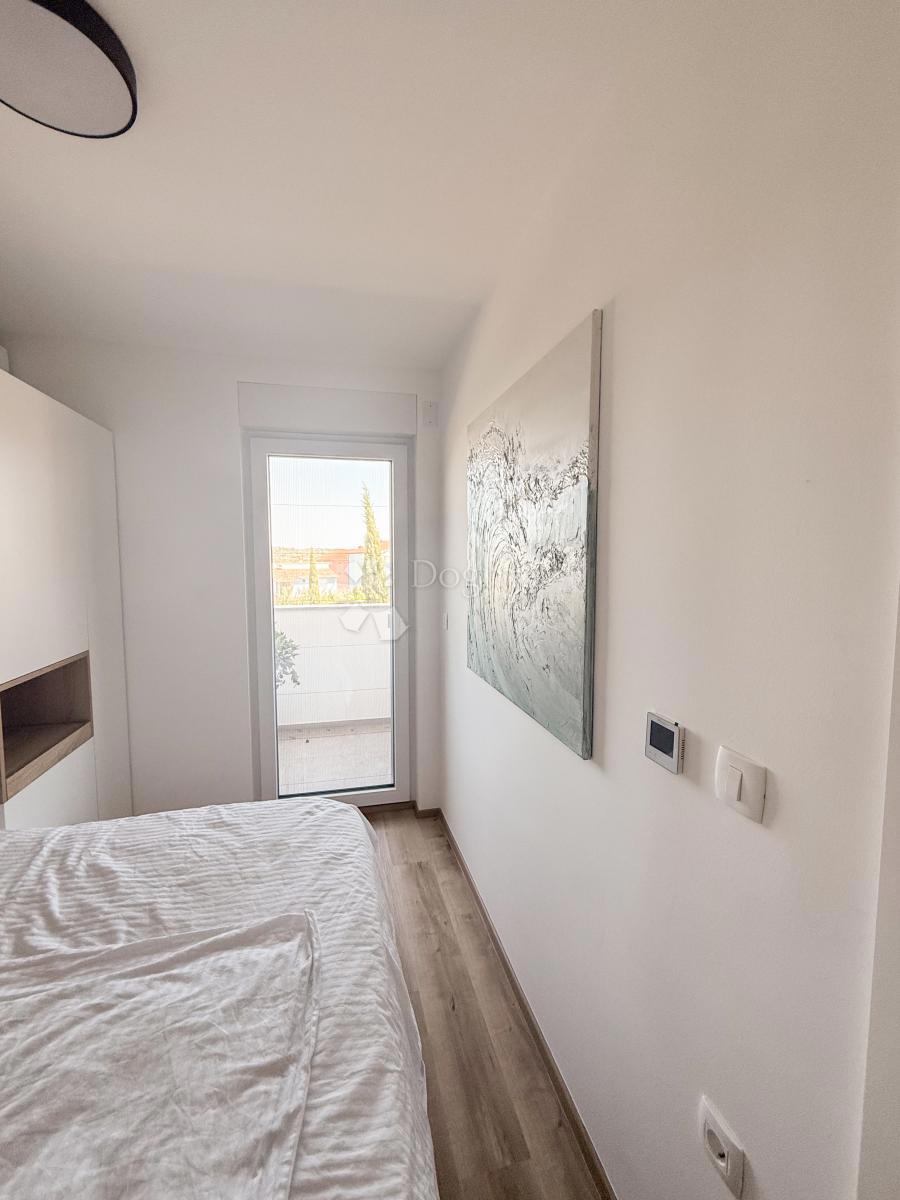 MEDOLINO - Appartamento smart home con terrazza e cortile!