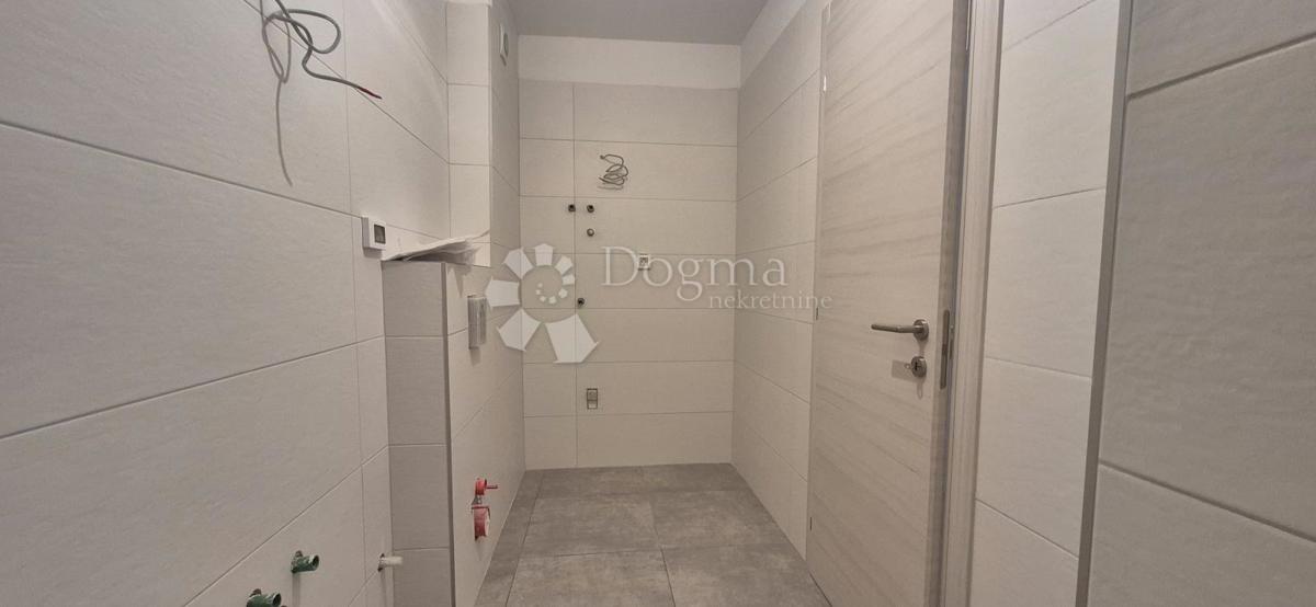 Appartamento con due camere da letto in un nuovo edificio a 1 km dal mare, superficie 54,47 m2