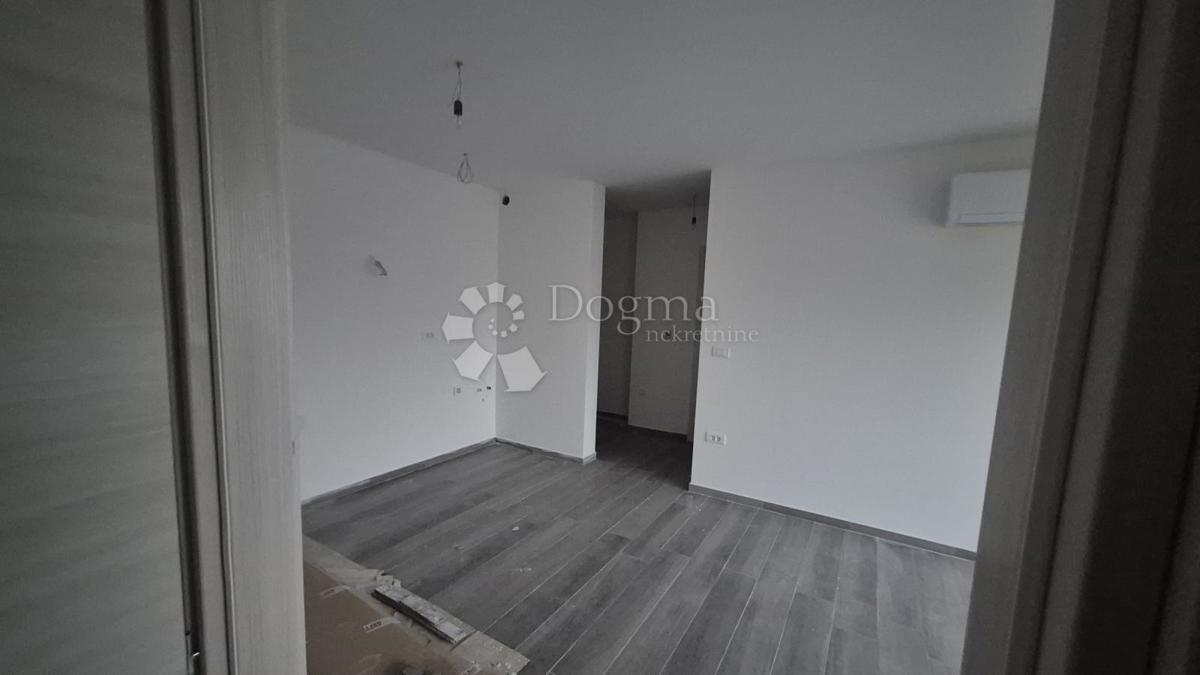 Appartamento con due camere da letto in un nuovo edificio a 1 km dal mare, superficie 54,47 m2