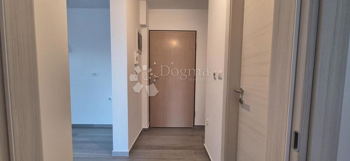 Appartamento con due camere da letto in un nuovo edificio a 1 km dal mare, superficie 54,47 m2