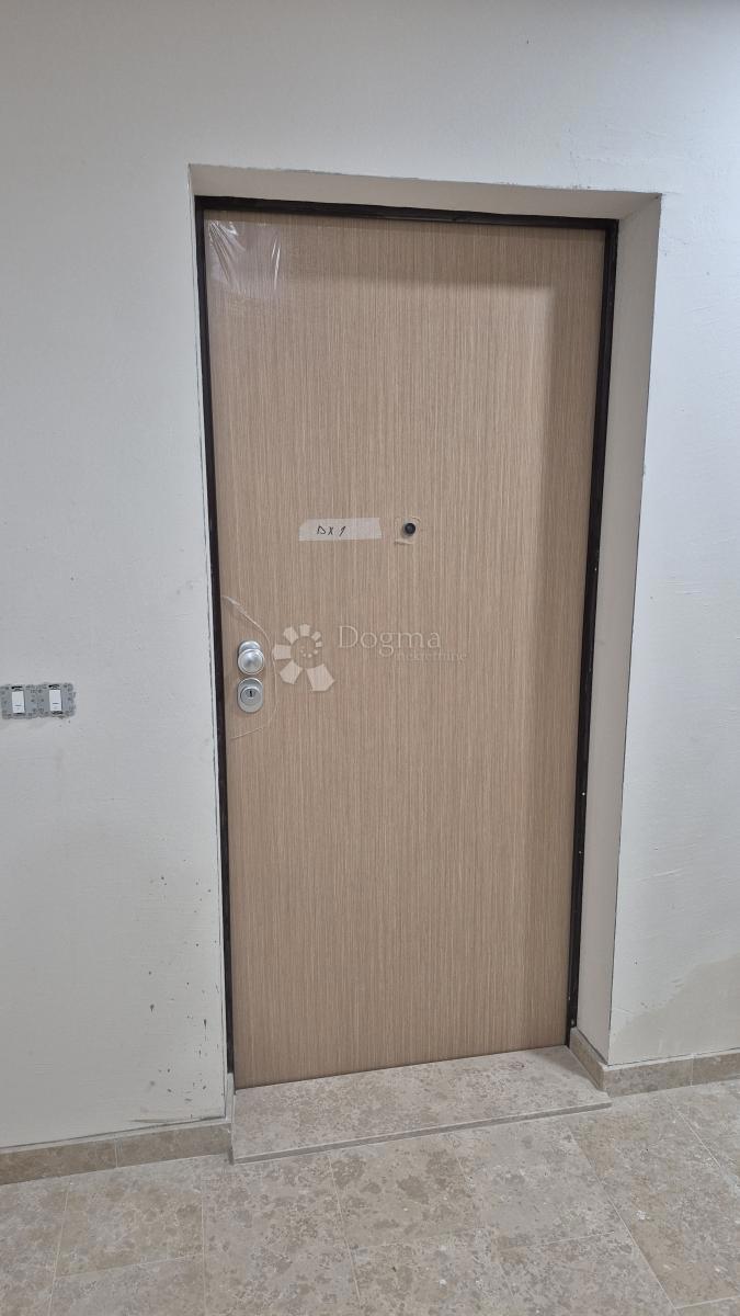 Appartamento con due camere da letto in un nuovo edificio a 1 km dal mare, superficie 54,47 m2