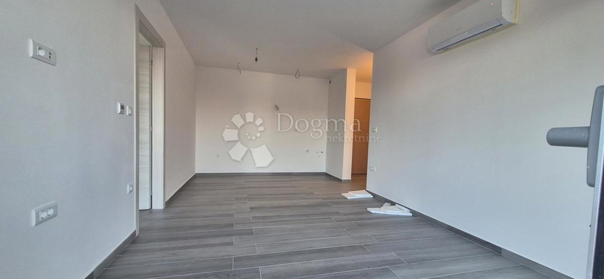 Appartamento con due camere da letto in un nuovo edificio a 1 km dal mare, superficie 54,47 m2