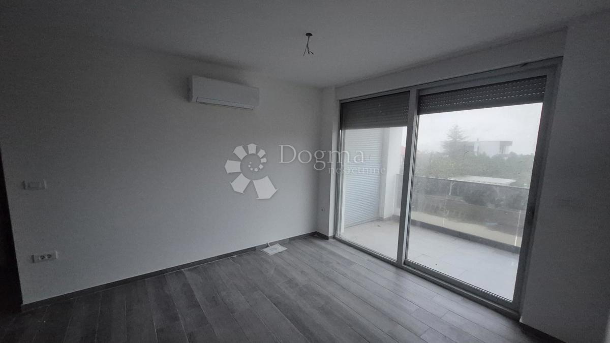 Appartamento con due camere da letto in un nuovo edificio a 1 km dal mare, superficie 54,47 m2