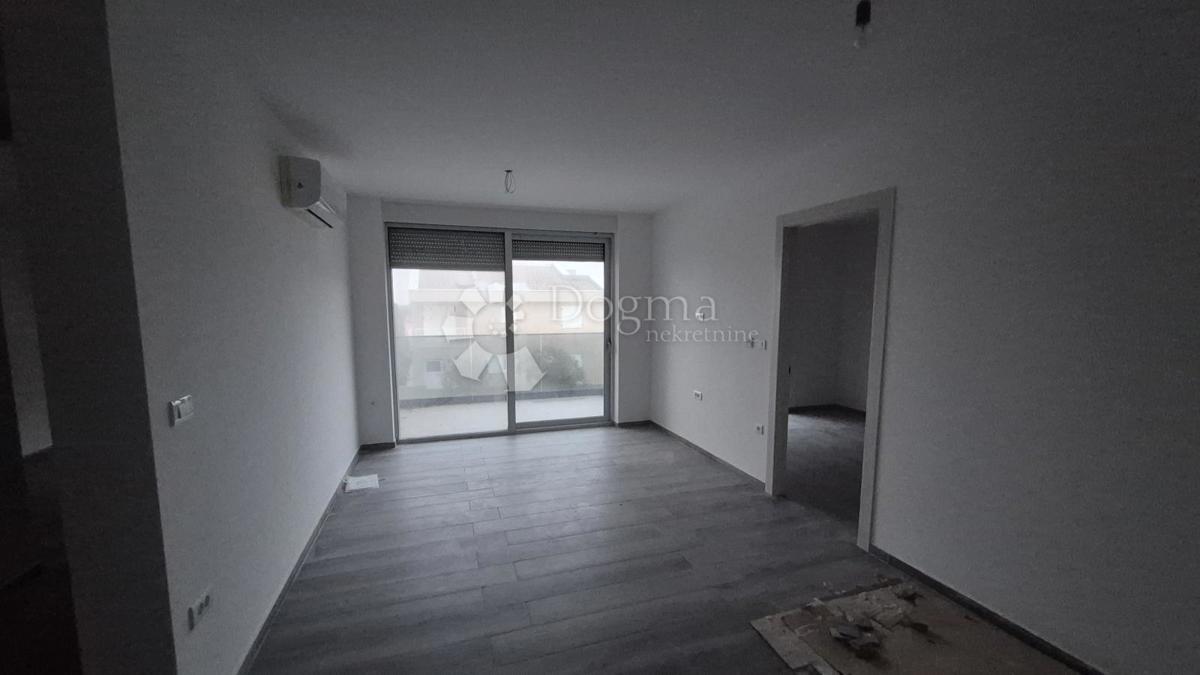 Appartamento con due camere da letto in un nuovo edificio a 1 km dal mare, superficie 54,47 m2