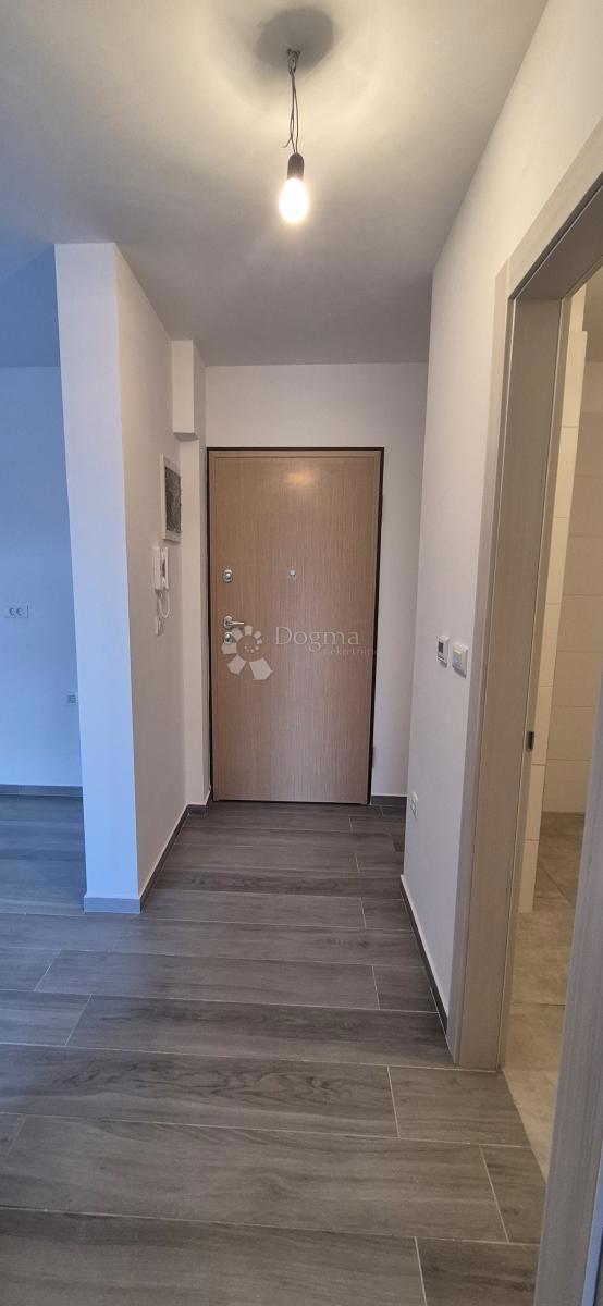 Appartamento con due camere da letto in un nuovo edificio a 1 km dal mare, superficie 54,47 m2