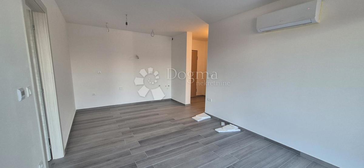 Appartamento con due camere da letto in un nuovo edificio a 1 km dal mare, superficie 54,47 m2