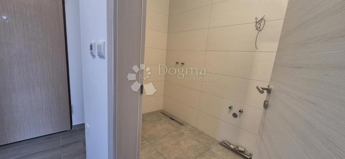 Appartamento con due camere da letto in un nuovo edificio a 1 km dal mare, superficie 54,47 m2