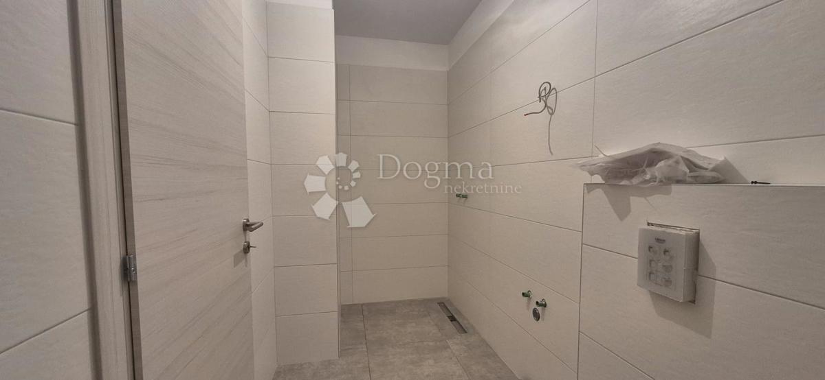 Appartamento con due camere da letto in un nuovo edificio a 1 km dal mare, superficie 54,47 m2