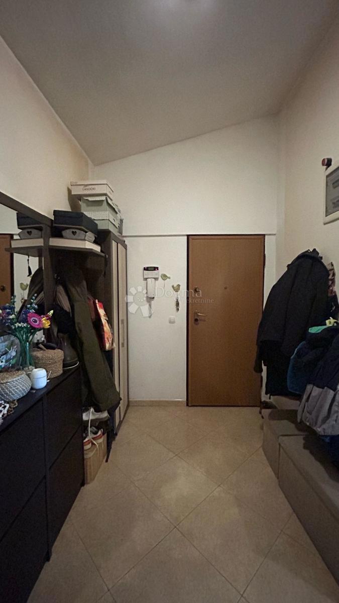 Appartamento con due camere da letto e loggia - 83m2 - Dignano