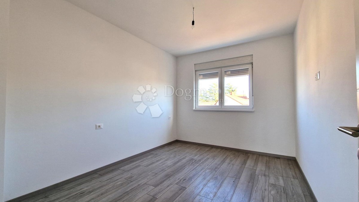 Spazioso appartamento con garage e 2 balconi in bella posizione!