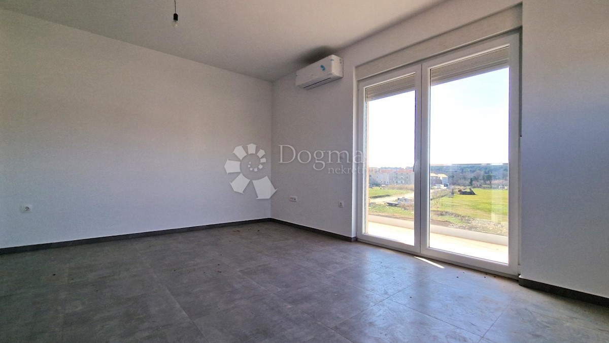 Spazioso appartamento con garage e 2 balconi in bella posizione!