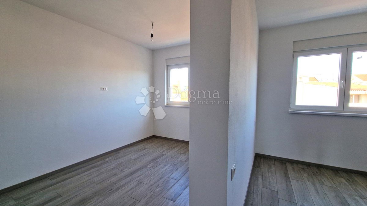 Spazioso appartamento con garage e 2 balconi in bella posizione!