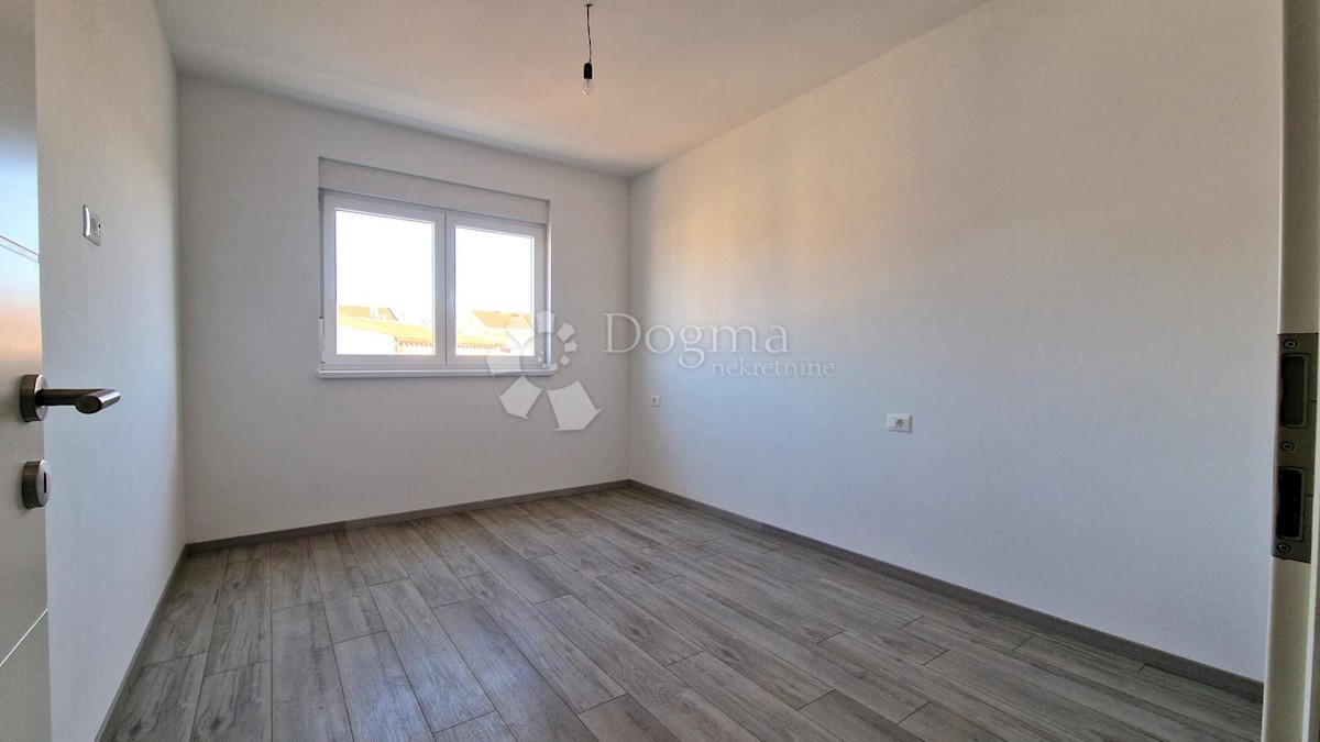 Spazioso appartamento con garage e 2 balconi in bella posizione!