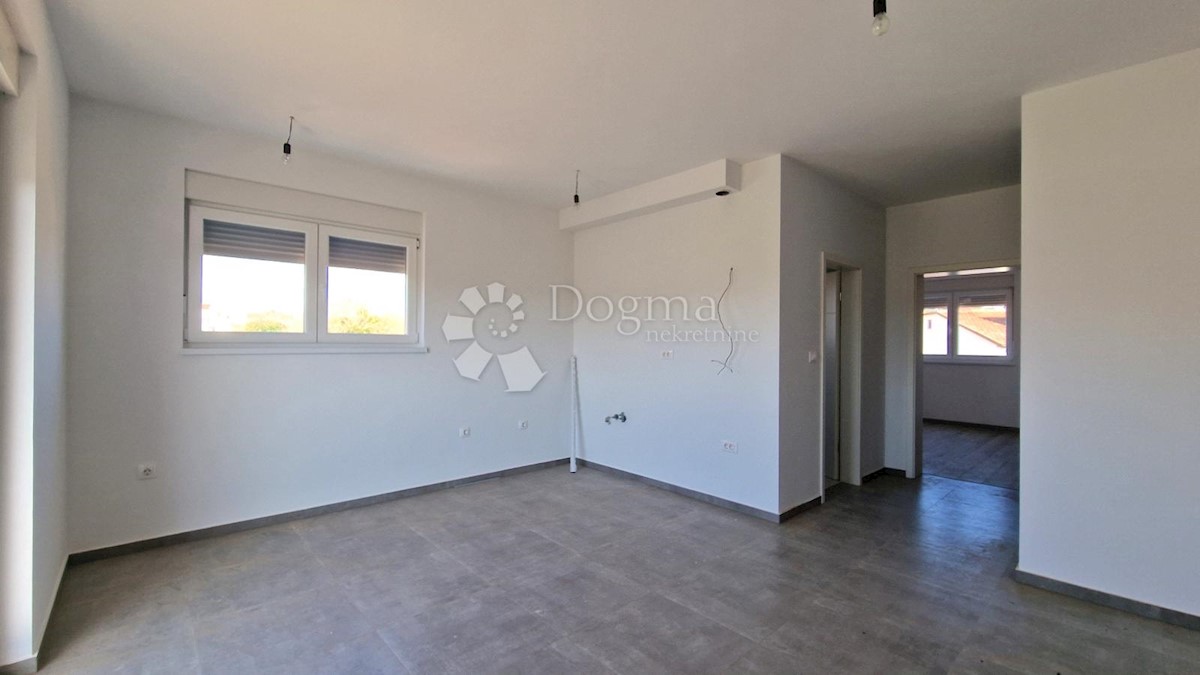 Spazioso appartamento con garage e 2 balconi in bella posizione!