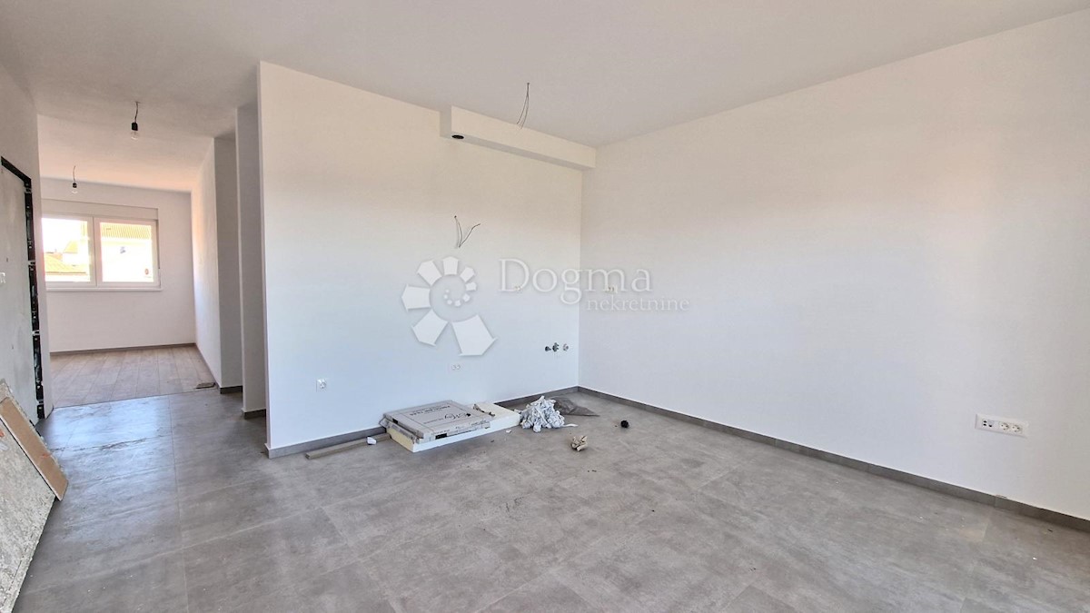 Spazioso appartamento con garage e 2 balconi in bella posizione!