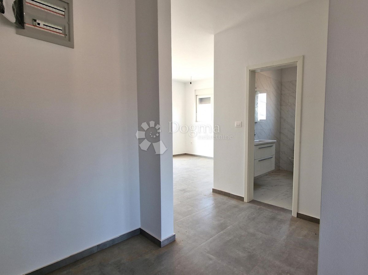 Spazioso appartamento con garage e 2 balconi in bella posizione!