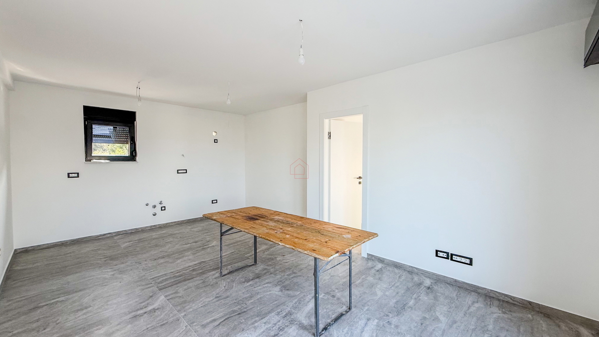 Nuova costruzione 2025 - appartamento con due camere da letto e giardino