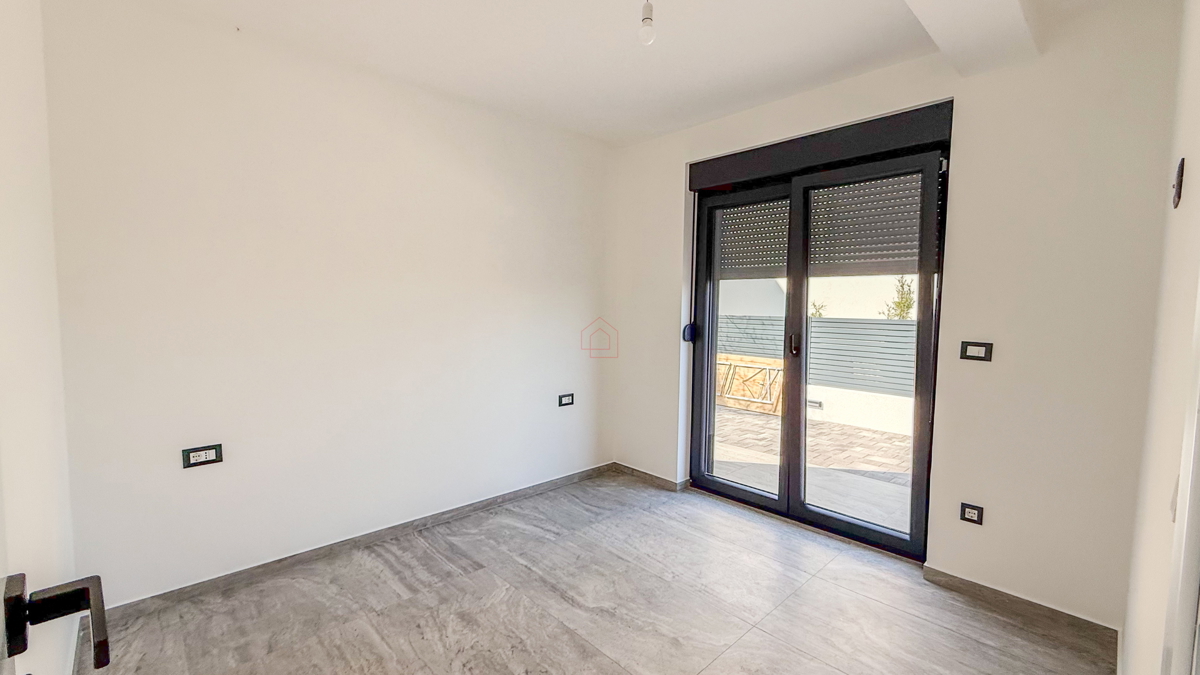 Nuova costruzione 2025 - appartamento con due camere da letto e giardino