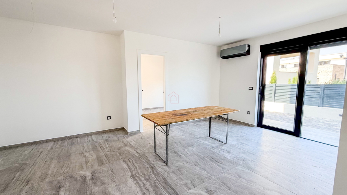 Nuova costruzione 2025 - appartamento con due camere da letto e giardino