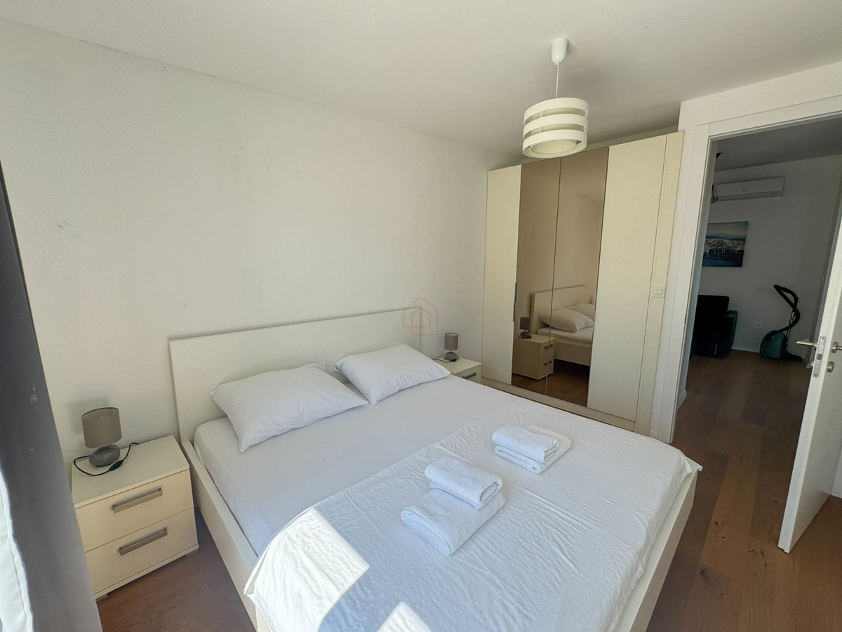 Attico con tre camere da letto, vista panoramica e garage