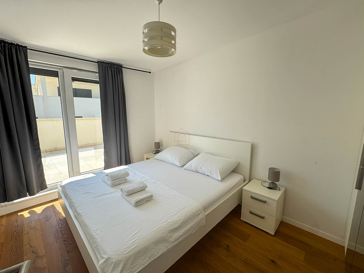 Attico con tre camere da letto, vista panoramica e garage