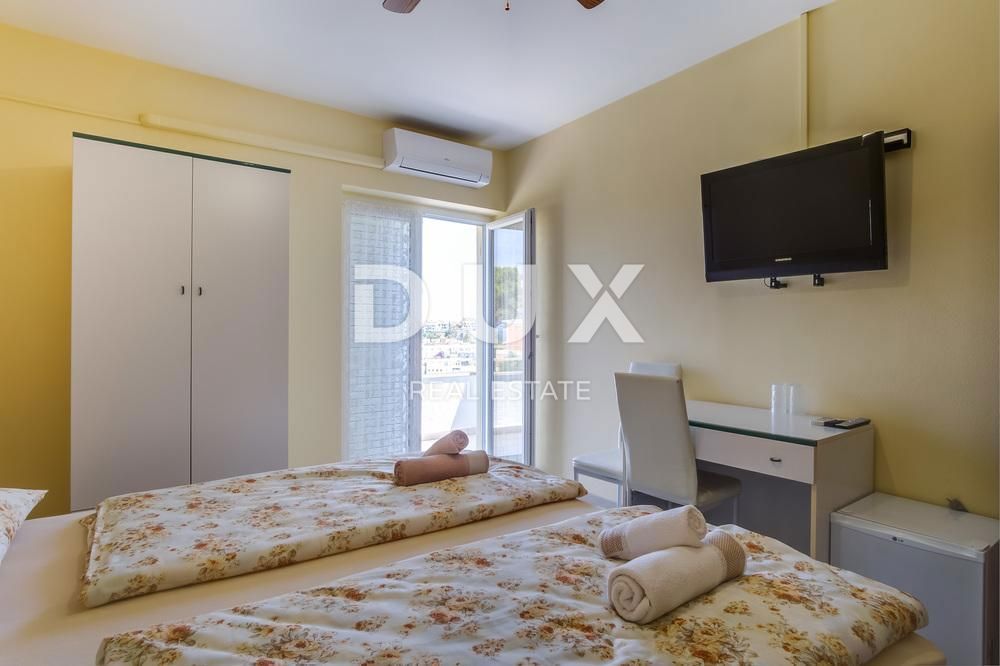 MALI LOŠINJ, CENTRO – Villa a Mali Lošinj, a 200 m dal mare – Vista perfetta e attività commerciale avviata