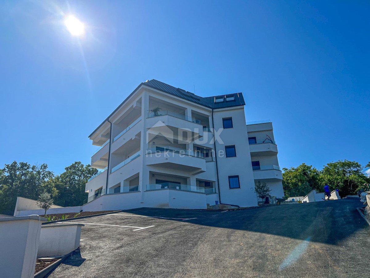 OPATIJA, IČIĆI - piano terra - appartamento più grande con giardino in un nuovo edificio con vista sul mare, POSIZIONE!