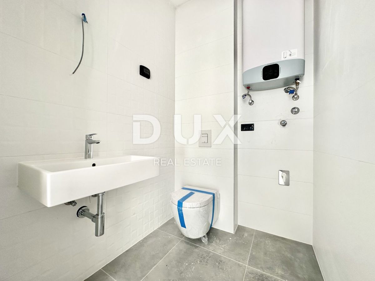ISTRIA, UMAGO - Stupendo trilocale + bagno con giardino in una nuova costruzione