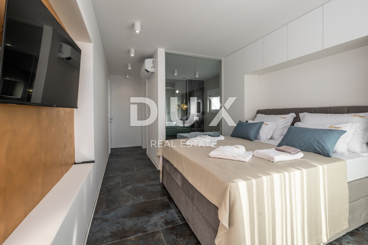 ISOLA DI PAG, NOVALJA - Villa con 4 camere da letto, piscina e sauna, 148,50 m2