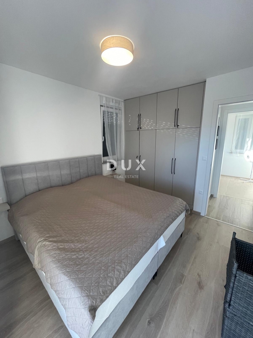 ISTRIA, MEDULIN - Appartamento in un nuovo edificio con due posti auto, arredato, vista mare