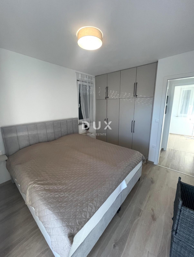 ISTRIA, MEDULIN - Appartamento in un nuovo edificio con due posti auto, arredato, vista mare