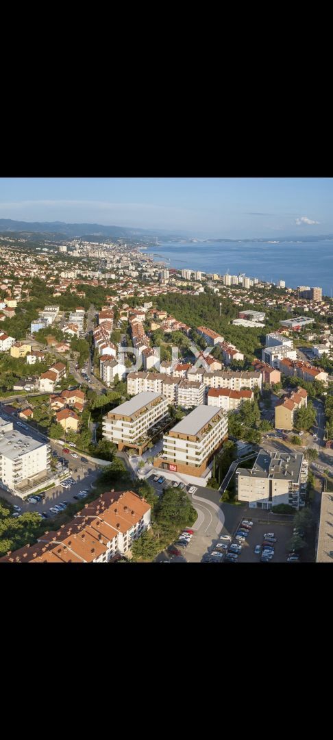 RIJEKA, SRDOČI - appartamento con orientamento S-O con terrazza di 47 m2 in un nuovo edificio con posto auto in garage
